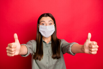 Sticker - Close-up portrait of her she nice attractive healthy straight-haired girl wearing safety mask shirt giving two thumbup stop mers cov isolated bright vivid shine vibrant red color background