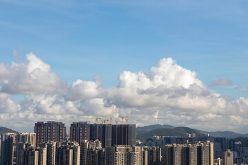 Sticker - timelapse of clouds over city