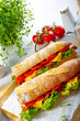crispy baguette with bacon, tomatoes and cheese