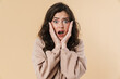© Drobot Dean - Image of scared shocked nice woman posing and looking at camera