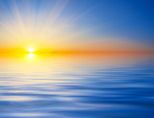 Wall Mural - bright sunset over the water