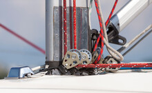 Pulley And Rope System At The Base Of The Mast For  Sail Installing On Board The Yacht