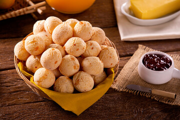 Wall Mural - Brazilian cheese buns . Table coffee in the morning with cheese bread in basket.