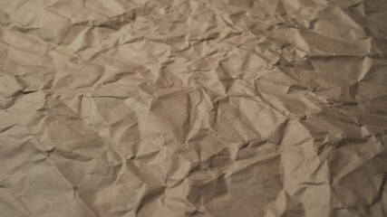 Wall Mural - Crumpled Wrapping Paper. Brown old material. Abstract textured background. Slow Track Camera
