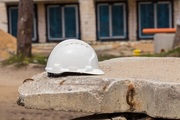 Worker's helmet on construction site