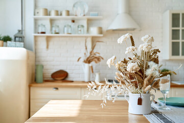 Kitchen wooden table top and kitchen blur background interior style scandinavian