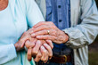 © heather linn photo - elderly married couple holding hands