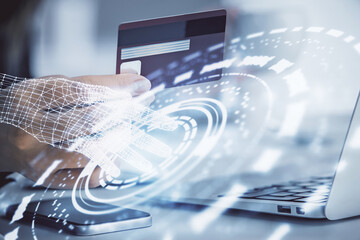 Fototapete - Double exposure of woman on-line shopping holding a credit card and data theme hologram drawing. E-commerce concept.