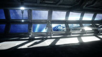 Wall Mural - alone astronaut in futuristic space corridor, room. view of the earth. cinematic 4k footage.