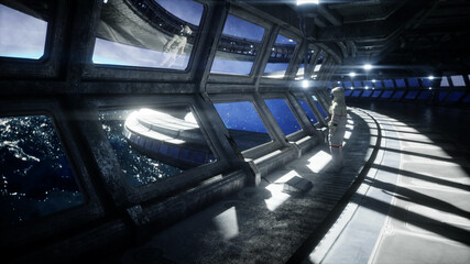 Wall Mural - alone astronaut in futuristic space corridor, room. view of the earth. 3d rendering.