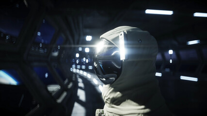 Wall Mural - alone astronaut in futuristic space corridor, room. view of the earth. 3d rendering.
