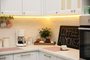 Canvas Print - Stylish kitchen interior with modern coffeemaker on countertop