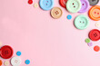 © New Africa - Many sewing buttons on pink background, flat lay. Space for text