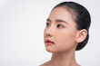 © Johnstocker - A beautiful woman with a good looking face turned to look at her right hand.