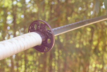 Katana Samurai Sword With Bamboo Forest  Background.