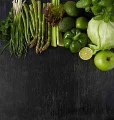 Wall Mural - green vegetables and herbs on black chalkboard