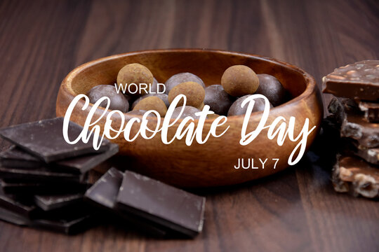 World Chocolate Day stock images. Different types of chocolate candies images. Pile of Chocolate stock images. Assorted chocolate candies isolated on a wooden background. Chocolate Day Poster, July 7