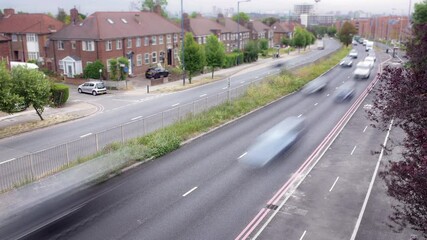 Canvas Print - Time lapse of fast moving traffic on urban London duel carriageway 