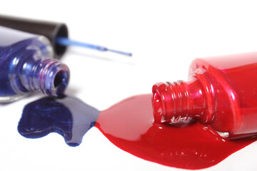 Poster - Red, White and Blue Nail Polish Spilled on White Background