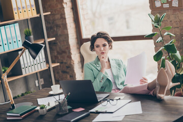 Wall Mural - Photo of attractive attentive business boss lady notebook table distance home remote work hold documents read contract look screen legs table confident chief sit chair modern office indoors