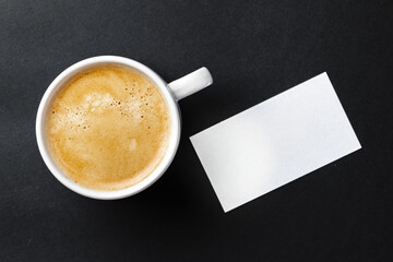 Wall Mural - Top view of cup with espresso and white business card template