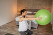 © Impact Photography - Pregnant woman exercising at home