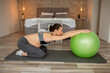 © Impact Photography - Pregnant woman working out with a fit ball