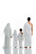 © Odua Images - asian muslim family hajj shot from behind with copyspace