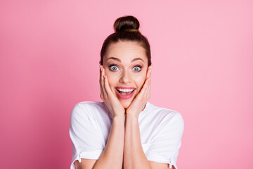 Wall Mural - Portrait of astonished positive girl hear wonderful novelty touch face hands scream wear good look clothes isolated over pink color background