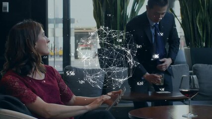 Web of connection forming a globe against woman using digital tablet  