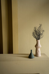 Wall Mural - Bedroom working corner decorated pink and blue ceramic vase on mustard color corrugated wall in the background /apartment interior /copy space