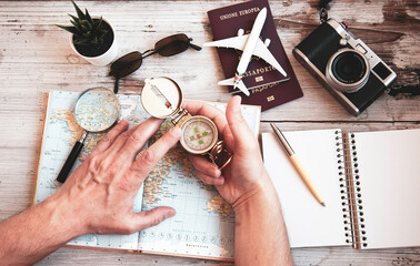 Young man planning world tour with vintage travel map - Backpacker guy looking for a new countries to explore - Journey trends, globetrotter and holiday concept - Adventures in the world