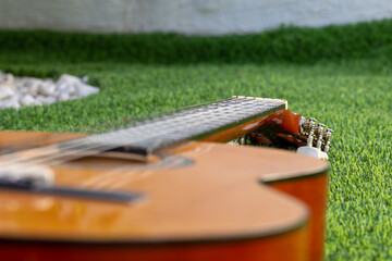 acoustic guitar on the grass