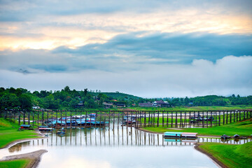 Wall Mural - morning light mon bridge in kanchanaburi.this wooden mon bridge is officially named uttama nusorn br
