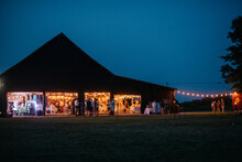 Night View Of A Party In A Barn