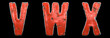 Set of letters V, W, X made of red painted metal isolated on black background. 3d