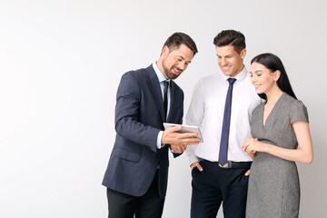 Poster - Group of business people on light background