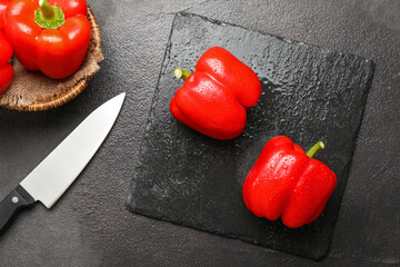 Composition with red bell pepper on table