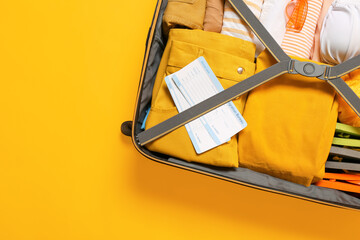 Sticker - Packed luggage on color background. Travel concept