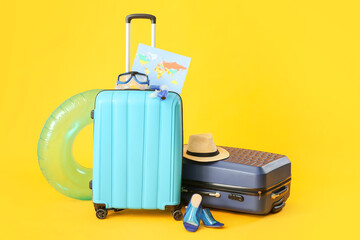 Canvas Print - Packed luggage on color background. Travel concept