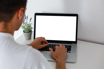 Side view of Open laptop computer. Modern thin edge slim design. Blank white screen display for mockup and gray metal aluminum material body isolated on blue background