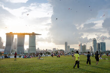View Of Sunset At Marina Barrage Singapore. People Come To Playing Kite And Enjoying Outdoor Activities