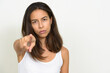 © Ranta Images - Portrait of stressed multi ethnic woman pointing at camera