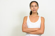 © Ranta Images - Portrait of beautiful multi ethnic woman with arms crossed