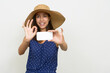 © Ranta Images - Happy beautiful multi ethnic tourist woman taking picture with phone and giving ok sign