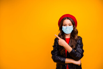 Sticker - Portrait of attractive confident long-haired girl wearing safety gauze mask demonstrating tips news novelty mers cov infection copy space isolated bright vivid shine vibrant yellow color background