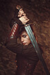 Beautiful woman fighting with sword