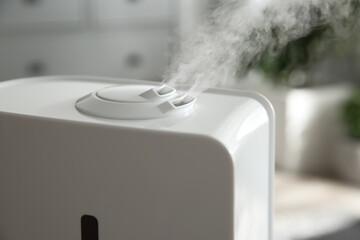 Canvas Print - Modern air humidifier at home, closeup view