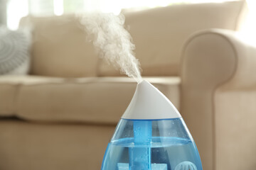 Canvas Print - Modern air humidifier at home, closeup view