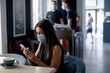 © GTeam - Portrait of a young smiling woman with mask covid virus